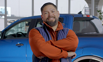 Guy standing in front of a truck